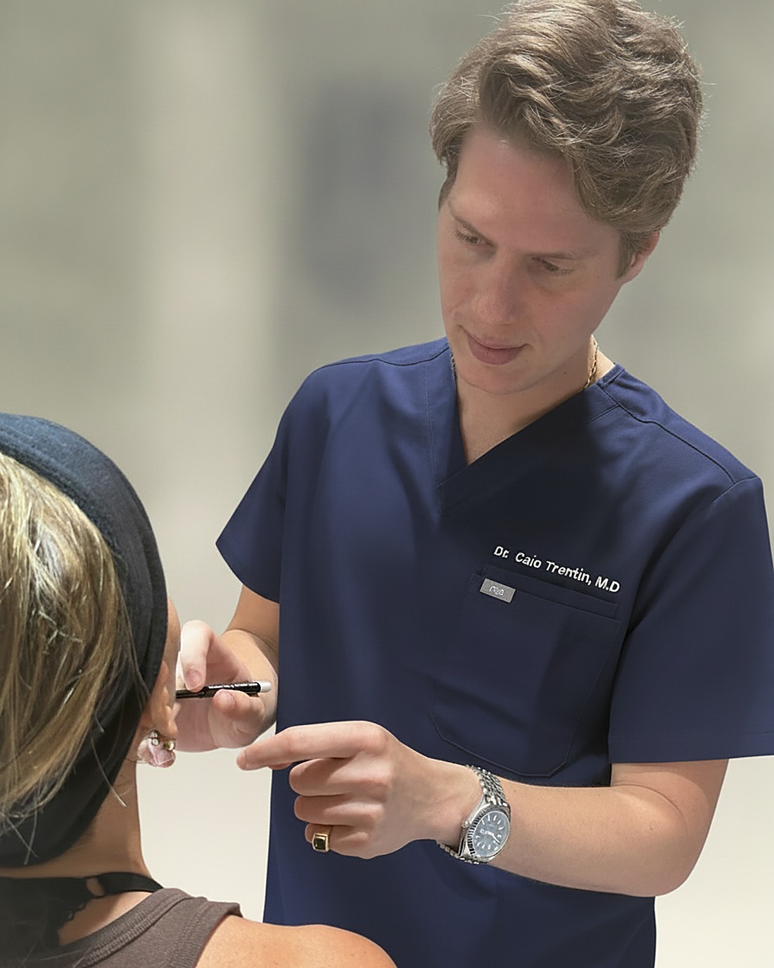 Dr. Trentin in consultation with a patient